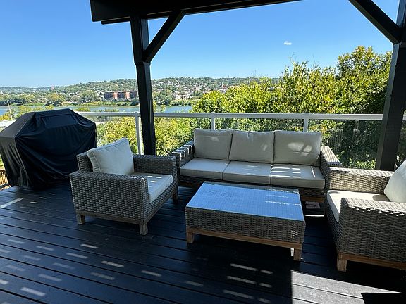 HUGE rear deck social space. Great for morning coffee, evening drinks, or just relaxing with friends.