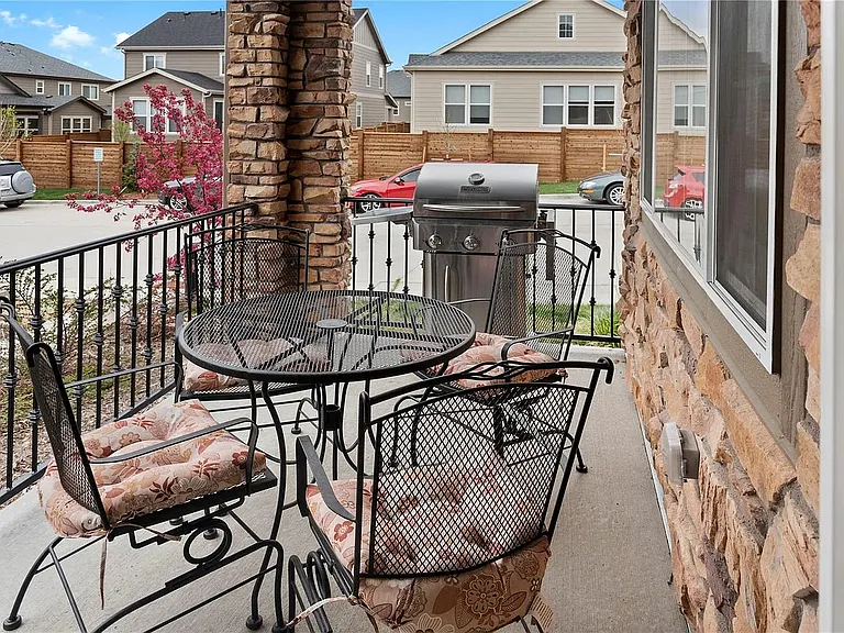 Outdoor patio with space for grilling and seating