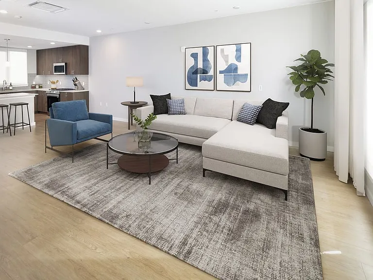 Townhome living room with hard surface flooring
