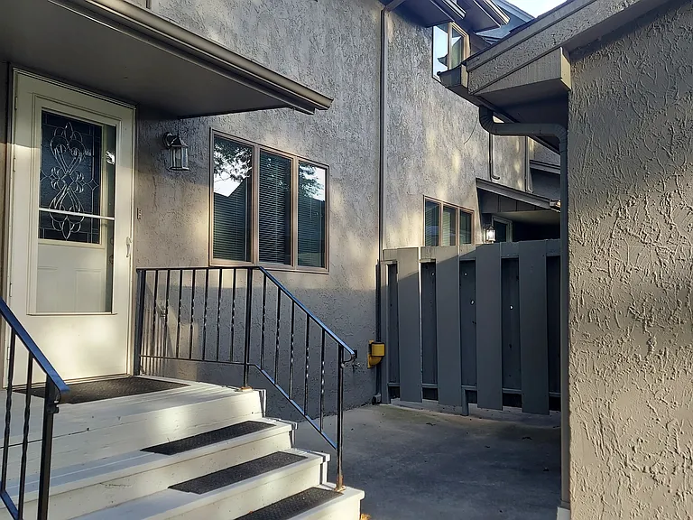 Private Patio between front door and garage service door.