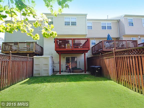 Rarely Available Grassed Rear Yard w/Covered Patio