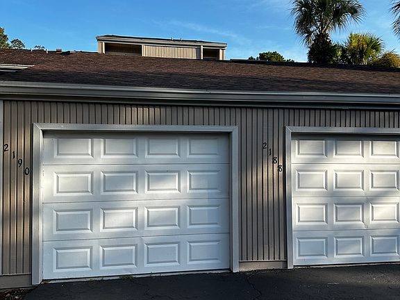One car garage with additional parking
