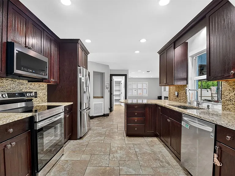 13808 Geranium Pl — Photo 9