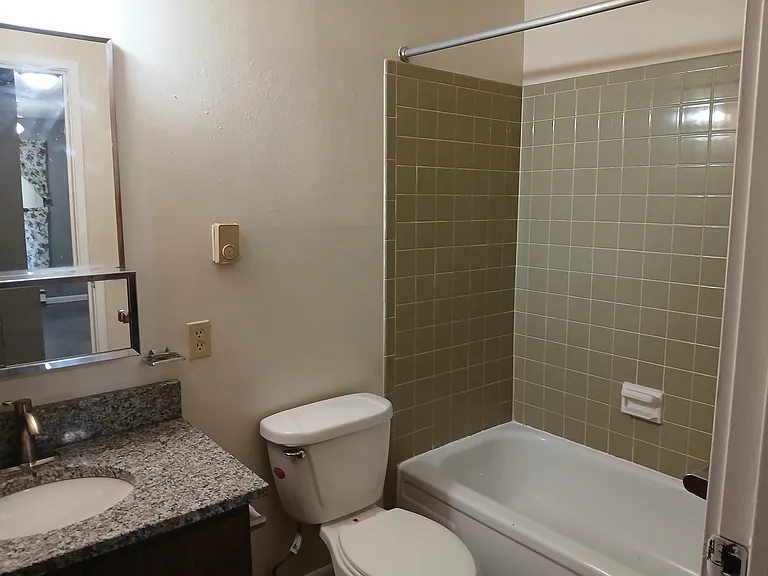 Tub, toilet and sink from doorway