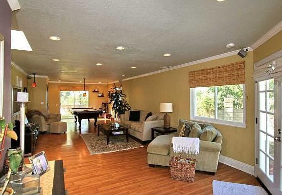 Family room offers open floor plan.