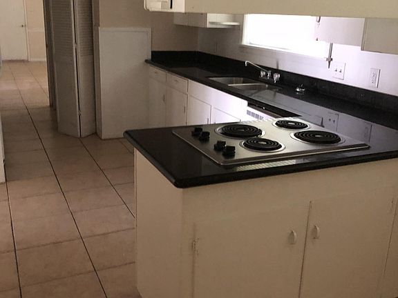 Kitchen with Stove, Fridge, dishwasher and oven.    Washer a