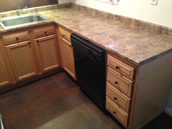 Large Countertops, New Floors, Cabinets and Paint
