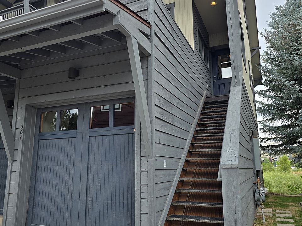 Unit located above garage. Stair access