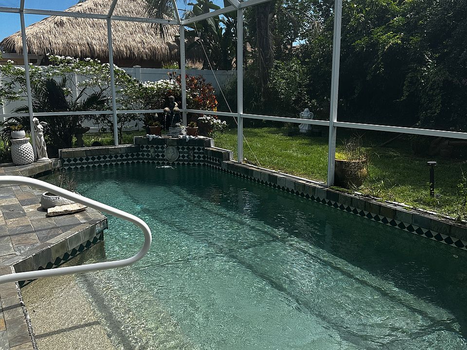 Relax by the pool and listen to the sound of falling water as your stress melts away.