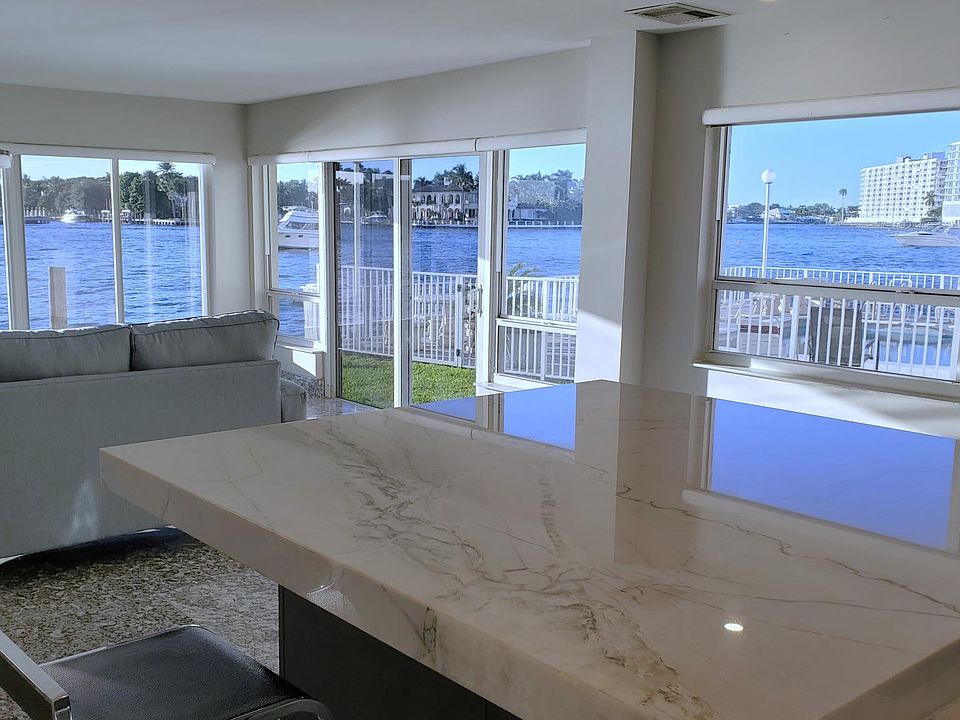 Newly renovated modern kitchen and gathering area. Views of ICWaterway from every room