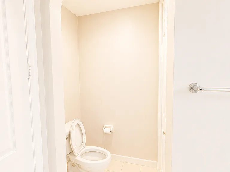 Master bathroom with separate toilet room and extra storage
