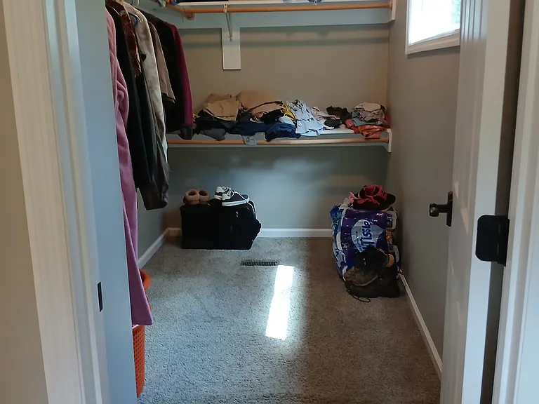 Huge walk-in closet in master suite
