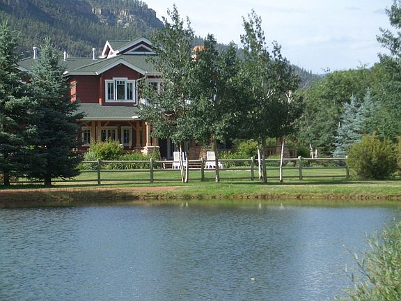 Back overlooks comm. pond