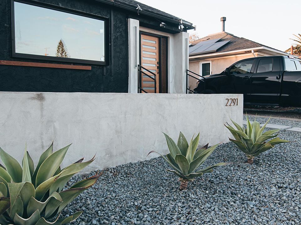 Modern landscaping and lighting.