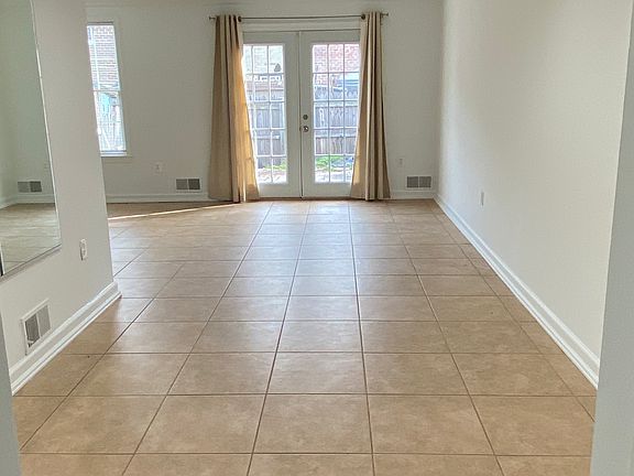 dining room/family room/doors to patio fenced backyard