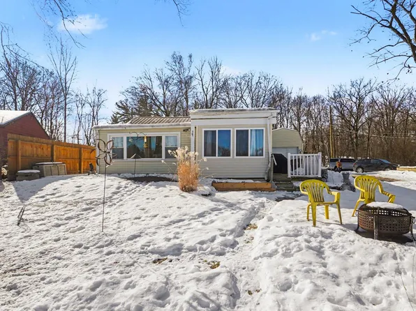 761 S Coolidge Dr, Six Lakes, MI 48886