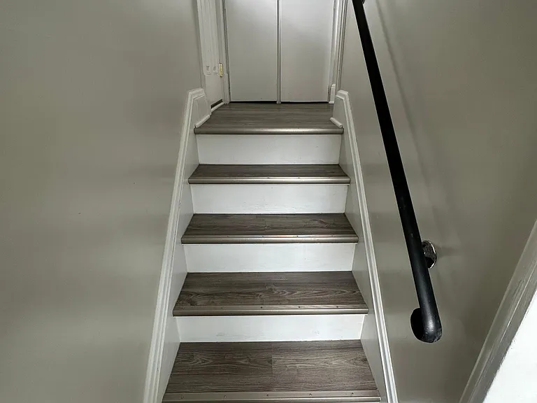 Back stairs to side door and basement