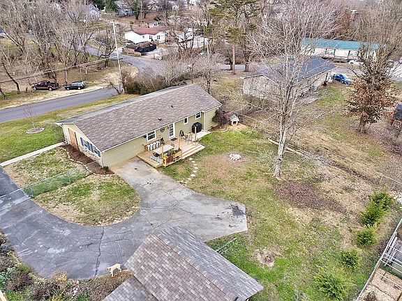 Level, fenced backyard 