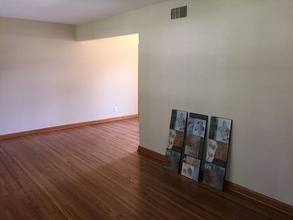 Living room with newly finished hardwood