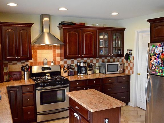 Kitchen - Pull-outs through-out kitchen + lazy Susan in corner & top corner cabinet
