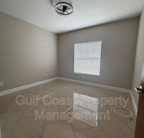 8555 Bernwood Cove Loop #103 — Photo 19