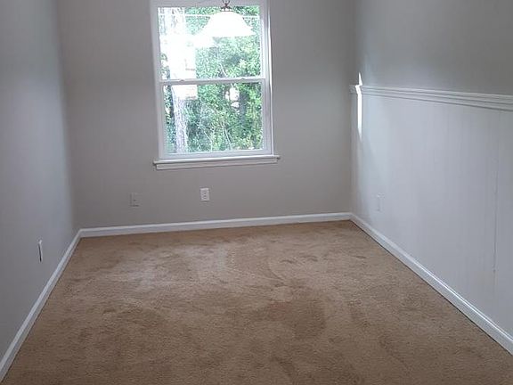 Second floor Unit w/carpet and wainscoting