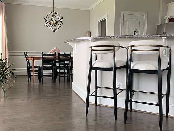 Open concept view to dining and kitchen areas