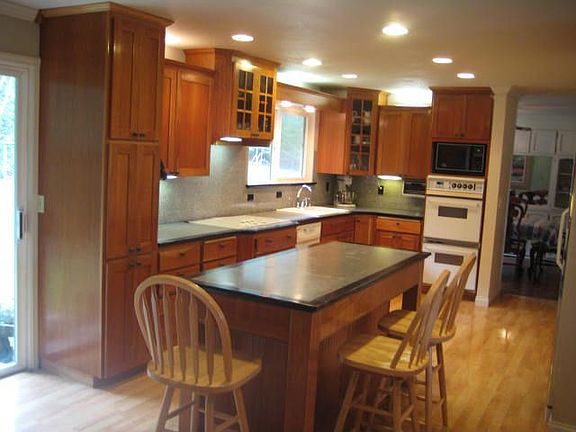 Gourmet Kitchen with custom natural cherry cabinets