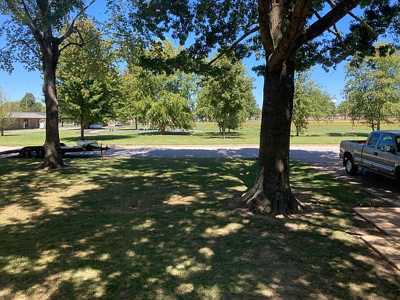 Park outside front door + Front yard