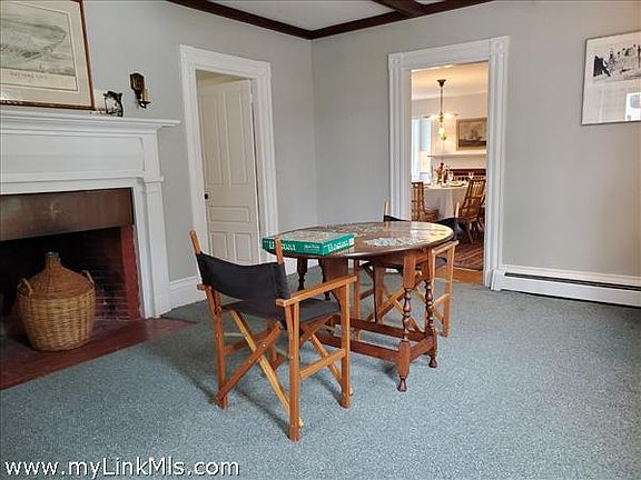 Large den with fireplace.