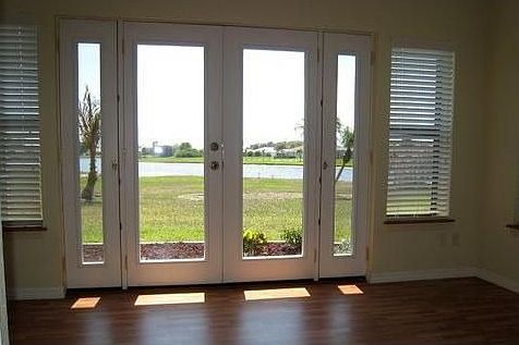 Sitting room off master bedroom has view of Lake Henry