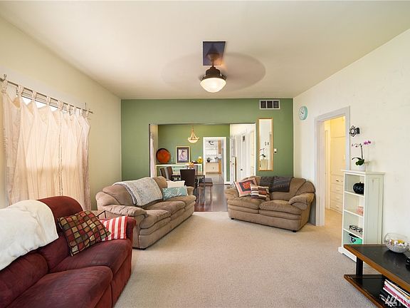 Family room with 2 bedrooms & Full bath to the right