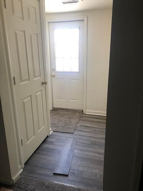Entry with laundry area and basement door