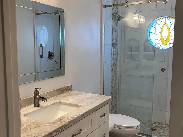 Fully remodeled guest bathroom.