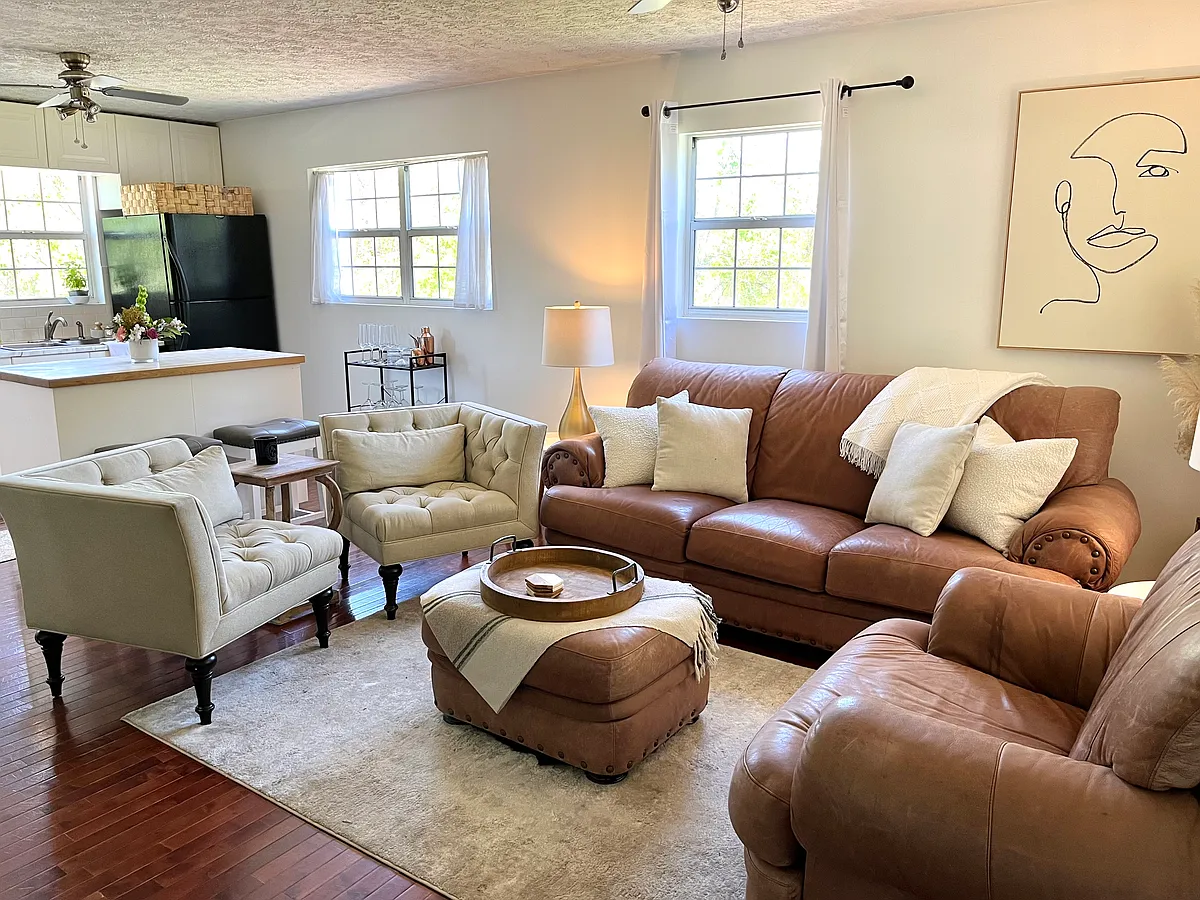 This house is rented unfurnished. Pictured here furnished to help you visualize the space. - 413 Beck Ave