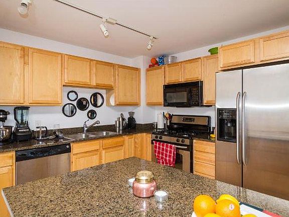 Kitchen. Granite Counters Stainless Steel appliances