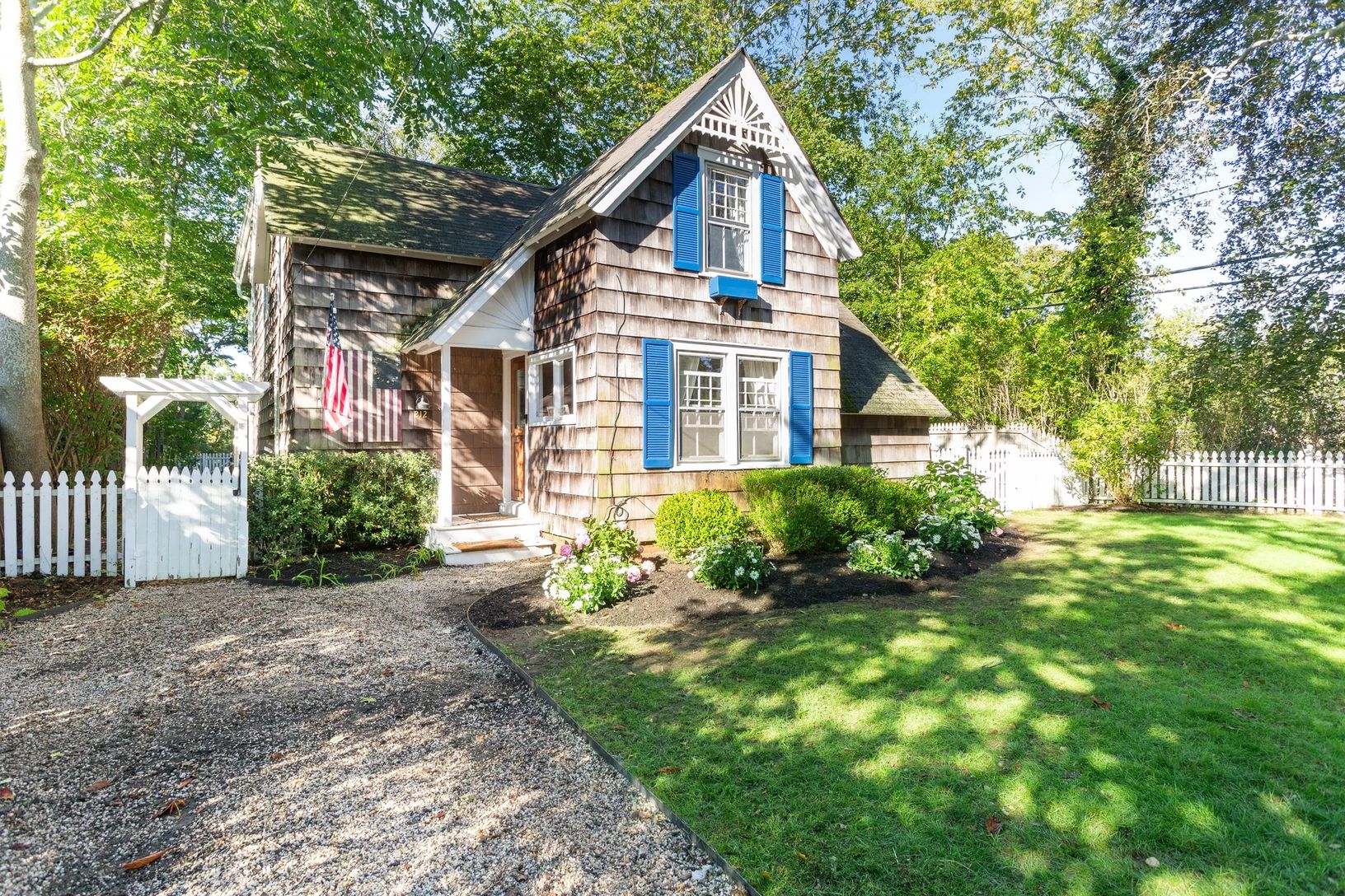  Classic Hamptons home with cedar shingles, new roof and plenty of off street parking 