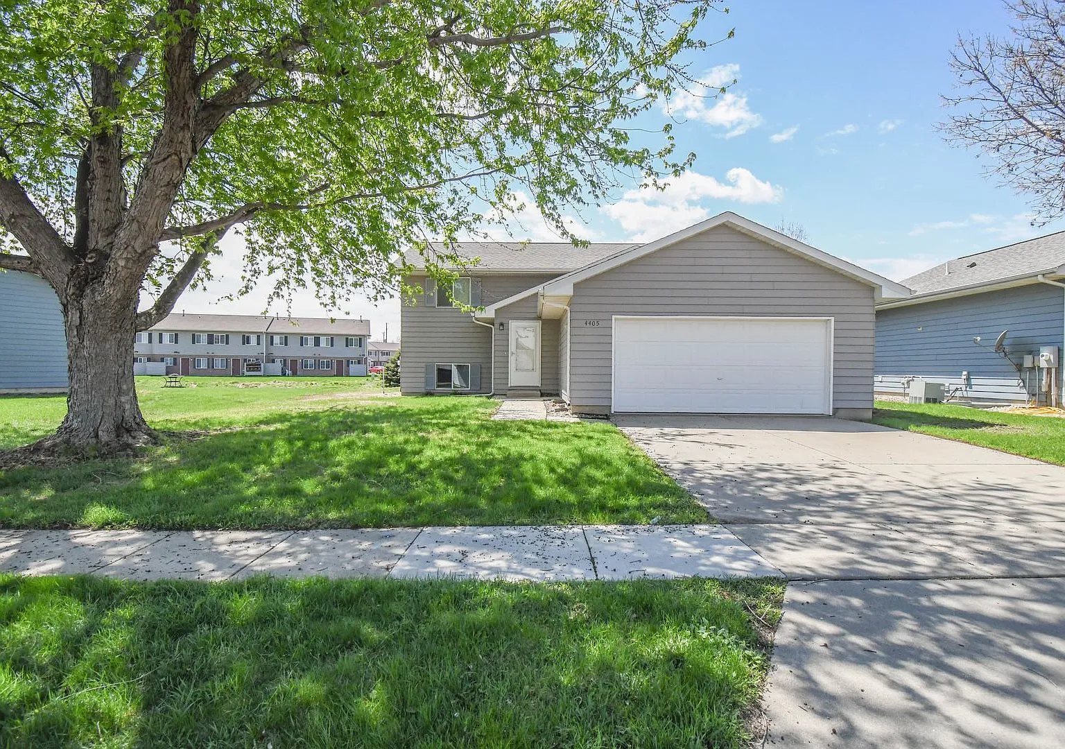 Updated 3BR Split-Level Home with Huge Deck, Fenced Yard & 2-Car Garage Near I-29! — Photo 2