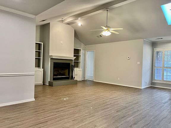 Beautiful focal fireplace, bookcases and multiple places to mount your TV!