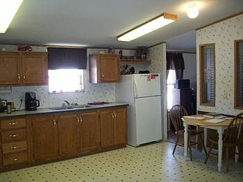 Another view of kitchen and dining area.