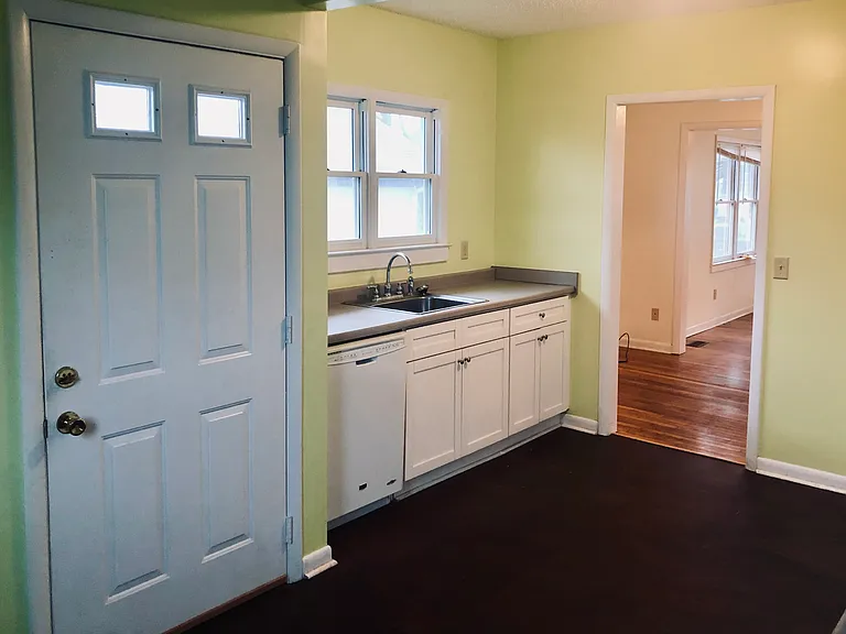 The kitchen is bright and sunny.