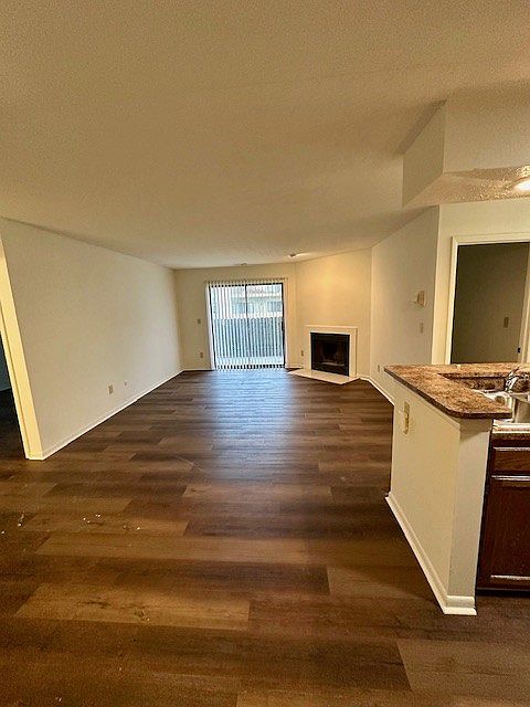 The living room of 2184 B with sliding glass doors to the patio