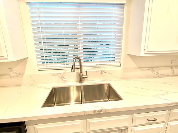 New sink, New granite counter top, new faucet