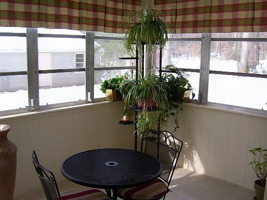 SUNROOM WITH NEW ANDERSON FULL VIEW STORM DOOR