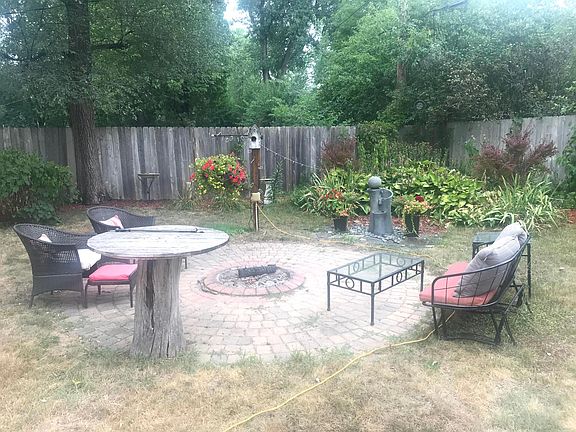 Beautiful back yard fire-pit patio with power.