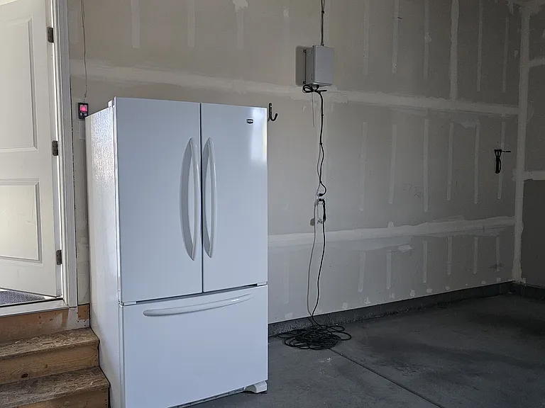 Additional Full large fridge in garage
