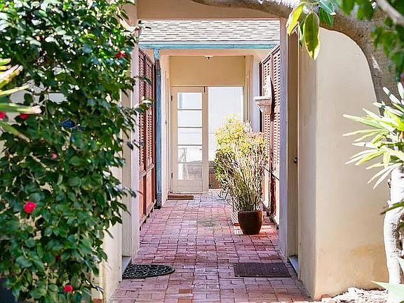 walkway towards the back of property.