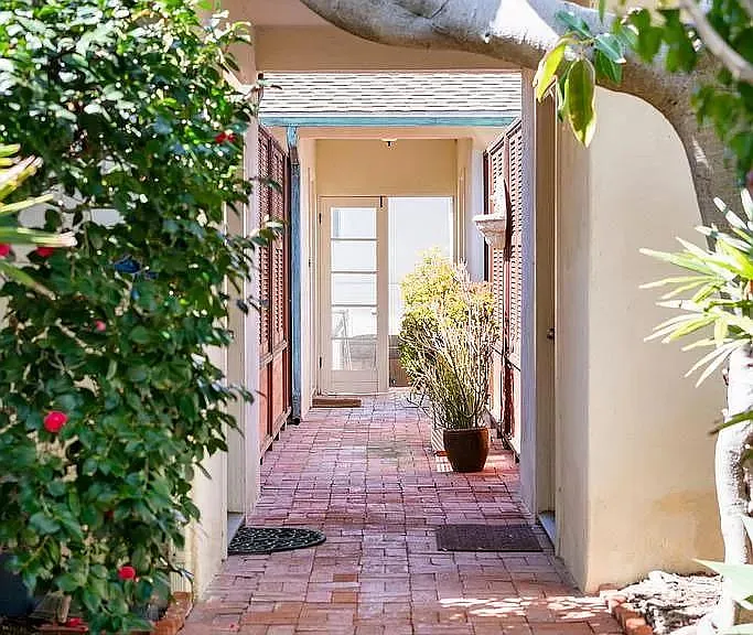 walkway towards the back of property.