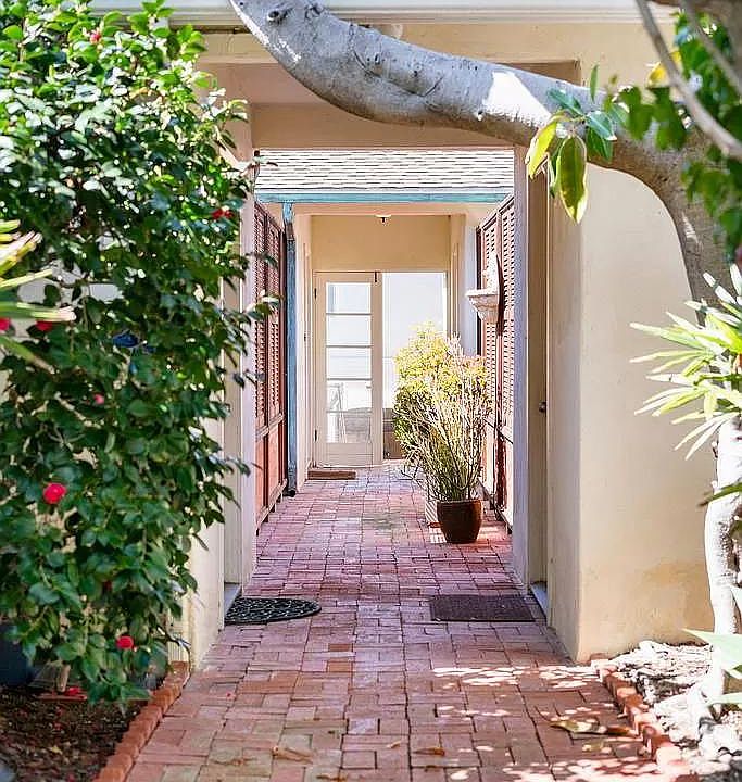 walkway towards the back of property.