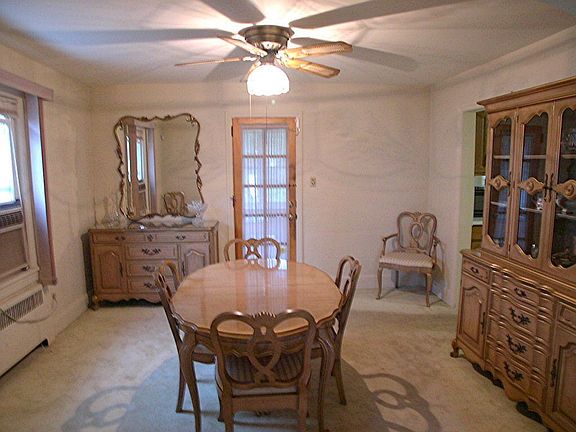 Formal Dining Room leads to three season porch